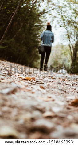 Similar – Young man running outdoors during workout in a forest