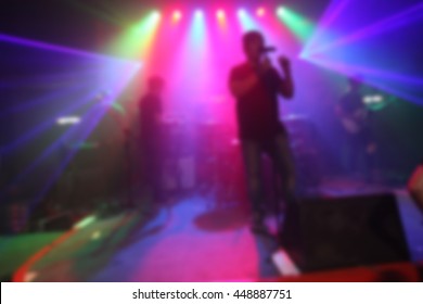 Blurred Singer Band On Stage In Pub 