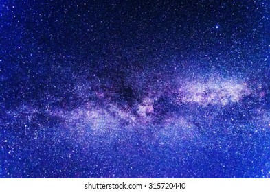 Blurred star background - the Milky Way at night - Shutterstock ID 315720440