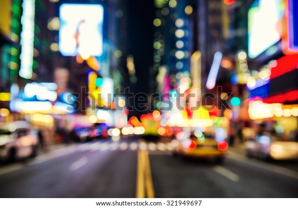 Blurred street illumination and night lights of New\
York City