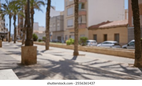 Blurred street with palm trees and buildings in an outdoor urban setting showcasing bokeh effect on a sunny day - Powered by Shutterstock