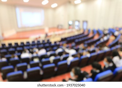 Blurred  Of Students, Audience Keynote Speaker, People Meeting Start Up Business Program Collaboration Discussion And Listen In Convention Hall Background Concept. Event University Or Campus.