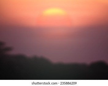Blurred sunset background.