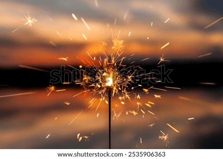 Blurred sunset background with warm orange tones. The background features a smooth texture with orange hues, enhancing the sparkler effect. Festive sparkler background, nature backdrop.
