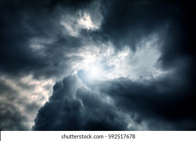 Blurred Swirl in the Dark Storm Clouds with Ray of the Light
