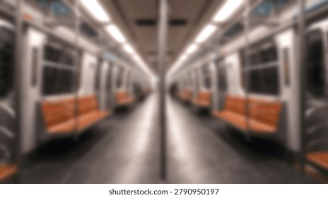 A blurred, symmetrical interior view of an empty modern subway train car with warm orange seats and bright white overhead lights.
