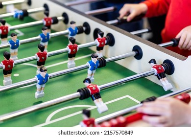 Blurred Table Football With Shiny Chrome Figures Close Up.