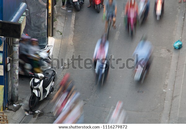 Blurred traffic in the streets of Saigon City. Life\
in Ho Chi Minh city.