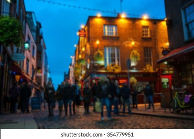 Blurred travel backgrounds - Nightlife at popular historical part of Dublin, Ireland - Temple Bar quarter. The area is the location of many bars, pubs and restaurants