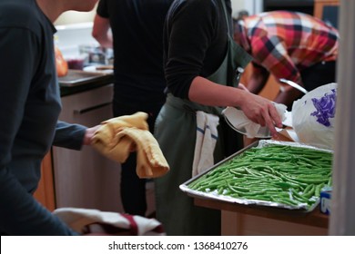 Blurred Various Thanksgiving Dinner Dishes Being Prepared And Served