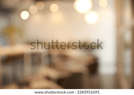 Blurred view of beautiful modern cafe interior