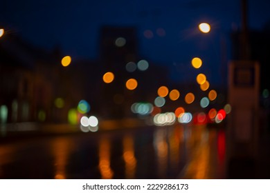 Blurred view of city street with lights at winter rainy night. Bokeh lights background. Abstract artistic photography. - Powered by Shutterstock