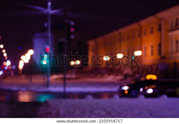 blurred view of city street\
at night