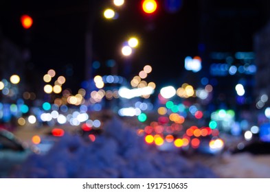Blurred View Of City Traffic Lights At Night
