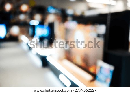 Blurred view of electronics store interior