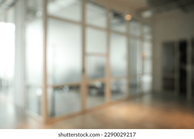 Blurred view of empty corridor in company - Shutterstock ID 2290029217