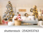 Blurred view of living room with grey sofa, Christmas tree and festive decorations