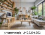 Blurred view of modern living room with sofa and soft bench. room interior with couch, armchair and coffee table or shelving units. stylish living room. comfortable workplace near big window.