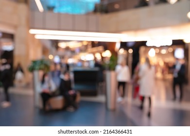 Blurred View Of Modern Shopping Mall Interior