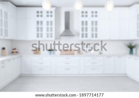 Blurred view of modern stylish kitchen interior