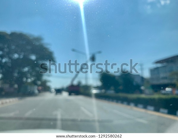Blurred\
vision looking out of car window\
background
