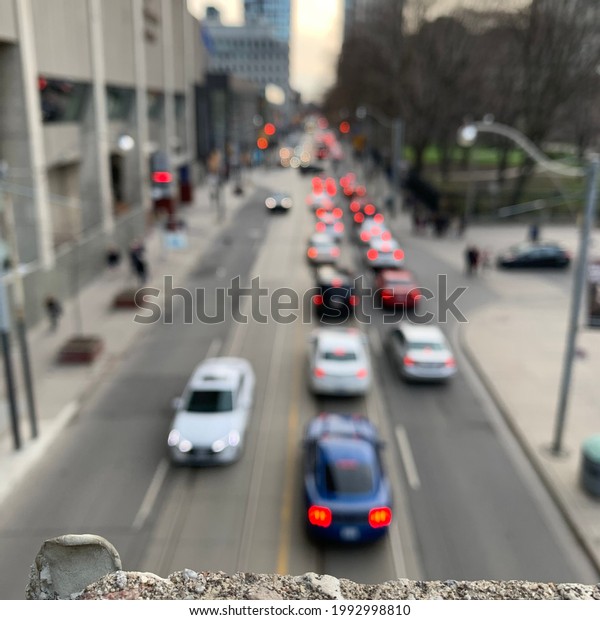 Blurred vision of\
traffic in Toronto downtown\
