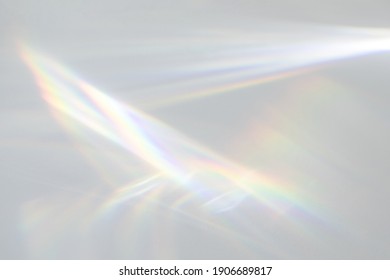 Blurred water texture overlay effect for photo and mockups. Organic drop diagonal shadow and light caustic effect on a white wall. Shadows for natural light effects - Shutterstock ID 1906689817
