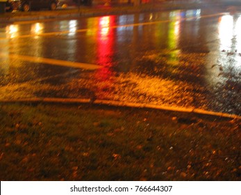 blurred wet surface, pavement, reflection of lights on the roadnight, 