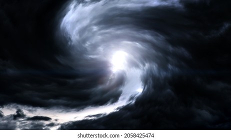 Blurred Whirlwind with a Light in the Dark Storm Clouds - Shutterstock ID 2058425474