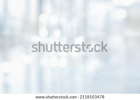 BLURRED WHITE OFFICE BACKGROUND, BLURRED BUSINESS ROOM WITH WINDOW LIGHT REFLECTIONS, MEDICAL INTERIOR