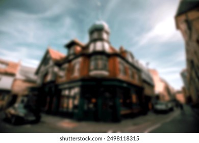 A blurred, wide-angle shot of a historic building in the UK with a bokeh effect. - Powered by Shutterstock