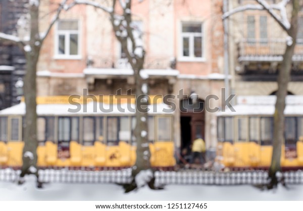 Blurred winter\
background city tourist train tour excursion New Year faritale\
Christmas Miracle holiday mood atmosphere lifestyle blizzard cold\
falls snow panorama old\
city