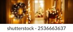 Blurred Winter Background of Blurred Winter Background of Festively Decorated Entryway with Wreath and Lights