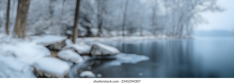 Blurred Winter Background of Blurred Winter Background of Winter Frozen Lake Shoreline with Covered Rocks - Powered by Shutterstock