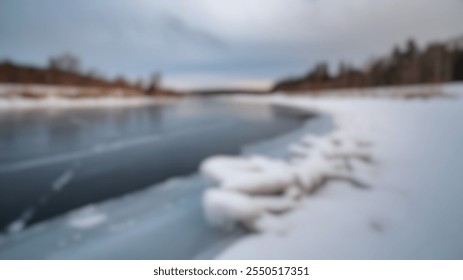 Blurred Winter Background of Frozen River with Ice Formations Along the Shoreline - Powered by Shutterstock