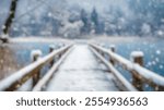 Blurred Winter Background of Blurred Winter Background of Snowy Wooden Pier Overlooking a Frozen Lake