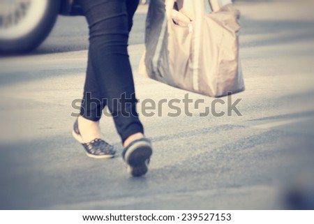 Blurred of woman walking
