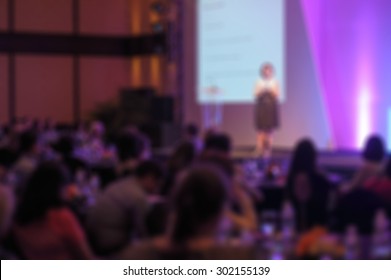 blurred women with projection screen -  conference Room