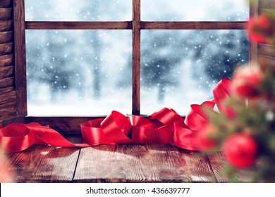 Blurred Xmas Tree And Window Sill And Ribbon 