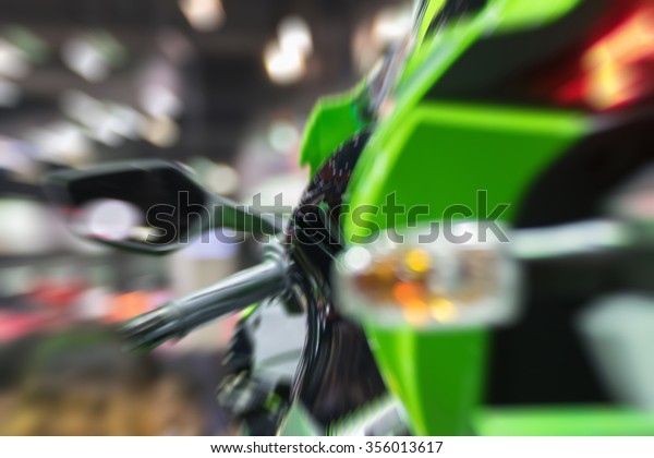 Blurred Zoom at motorcycle taillight in Car\
show event at Bangkok, Thailand. This a open event no need press\
credentials required.