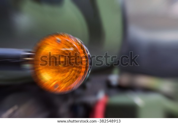 Blurred Zoom at motorcycle\
taillight in Car show event at Bangkok, Thailand. This a open event\
no need property release and press credentials\
required.