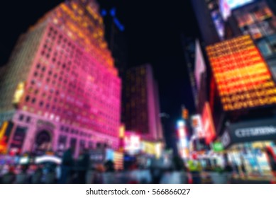 Blurried Picture Of NEW YORK CITY. Times Square Crowds And Traffic At Night