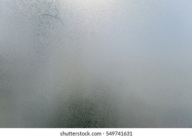 Blurry abstract background of foggy condensation on window glass natural surface - Powered by Shutterstock