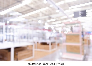 Blurry Abstract Image Of An Empty Warehouse In Furniture Shop Background