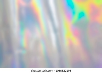 Blurry abstract pastel iridescent holographic foil background - Shutterstock ID 1066522193