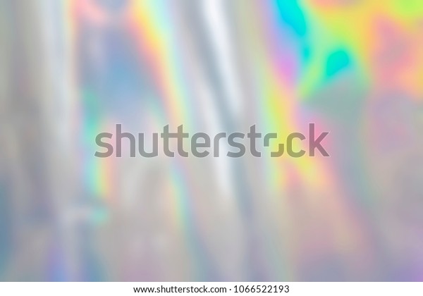 ぼかした抽象的なパステルの虹色のホログラフィックフォイル背景 の写真素材 今すぐ編集