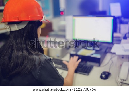 Blurry of architect woman typing computer for input data.