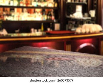 Blurry Background Of Bar And Desk 