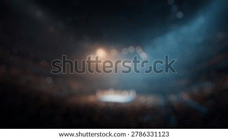 Blurry Background of Dramatic View of an Iconic Boxing Arena Filled with Fans Eagerly Awaiting the Fight Under Bright Spotlight