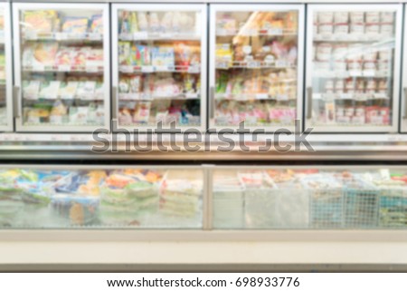 Blurry Background of Frozen food department in supermarket.